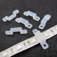 thumbnail image 2 of 50x LED Strip Mounting Clips 10mm Brackets Holders Plastic Silicone Screw Holes, 2 of 5