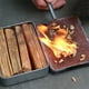 thumbnail image 1 of Kit de 13 piezas para iniciar fuego de supervivencia al aire libre | Varilla de fuego de pedernal y acero con tiras de madera en caja impermeable de acero inoxidable para acampar y emergencias, 1 of 6