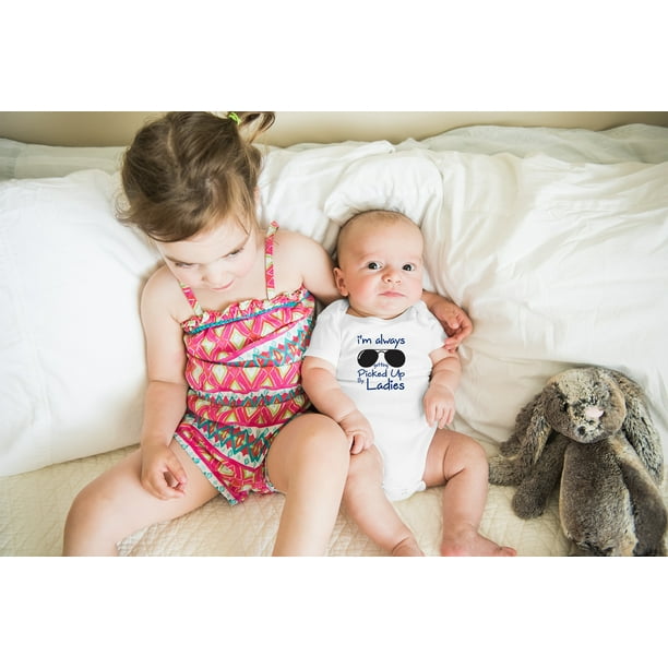 LADIES! GRAB THE BABY UO, 1 IN STOCK...CUTE 12,800+ Picking Up Baby Stock Photos, Pictures & Royalty  main image 3