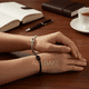 thumbnail image 2 of 2pzs Pulsera De Parejas Acero Inoxidable Nudo De Amor Para Mujeres Hombres Xtellar negro, 2 of 3