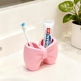 thumbnail image 5 of Plastic Bow Toothbrush Holder, 2-in-1 Countertop Pen Organizer, Nonslip Bathroom Accessory for Electric Toothbrush, Space-Saving Desk Decor for Home Office Dorm (Pink), 5 of 8