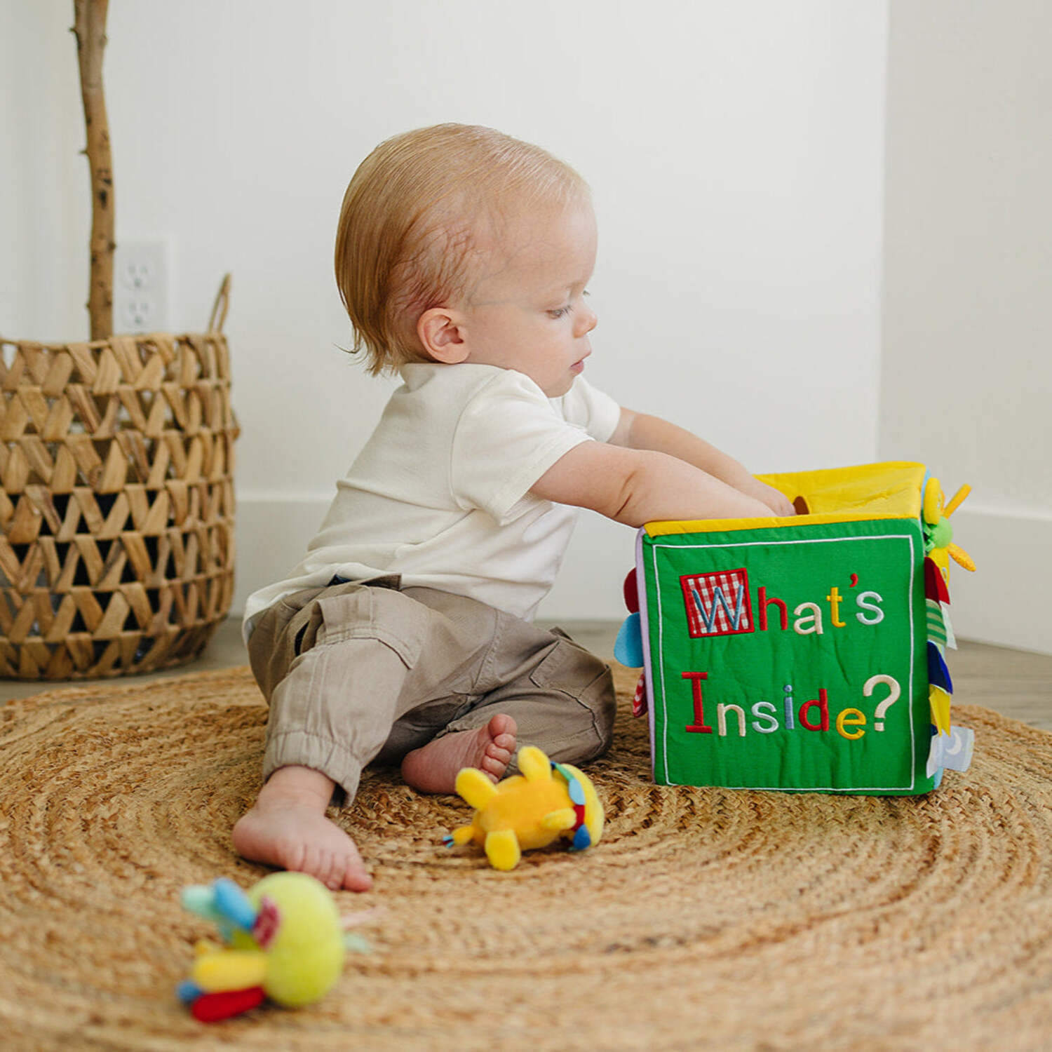 Genius Babies Baby Surprise Box with 8 Colorful Octopus Sensory Toys (7" x 7" x 7")