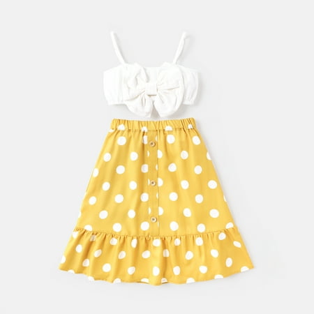 

PatPat 2pcs Toddler Girl Cotton Bowknot Design Camisole and Polka dots Button Design Skirt Set