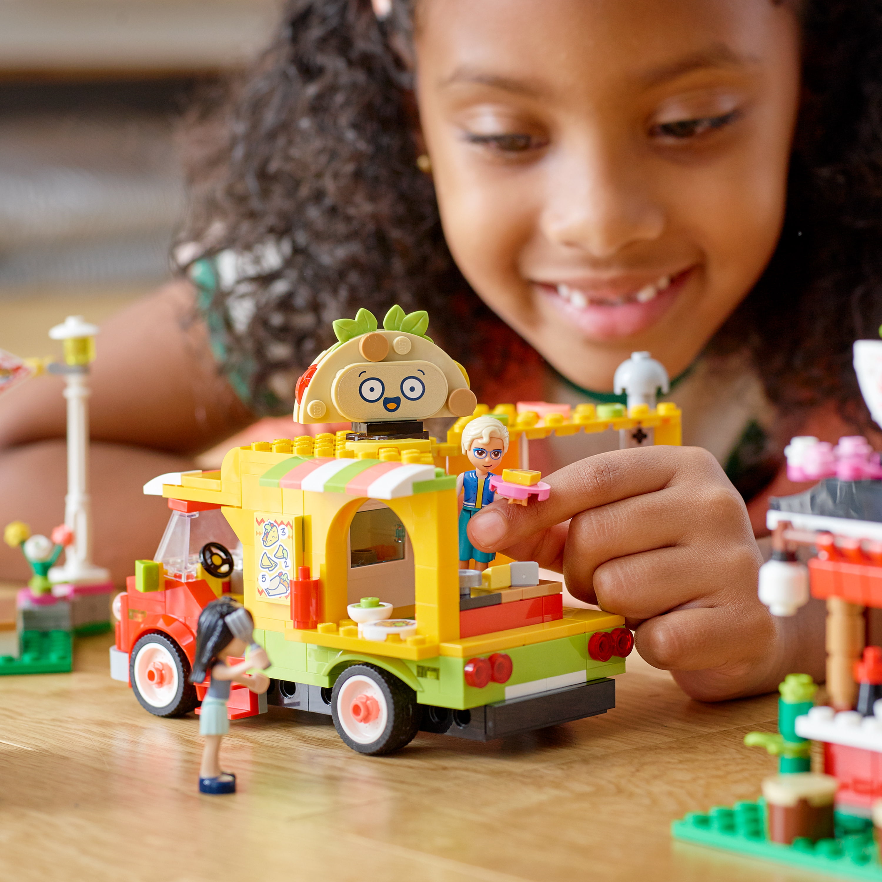 LEGO Friends Street Food Market 41701; New Food-Play Building Kit Promotes Imaginative Play; Includes Emma and Kitten Toy; Birthday Gift for Kids Aged 6+ (592 Pieces)