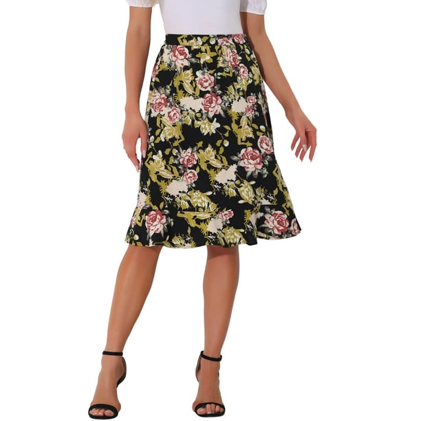 Faldas largas de mujer con flores de cintura alta y vuelo, con abertura y volantes, hasta la rodilla, en negro y beige para el Día de las Madres.