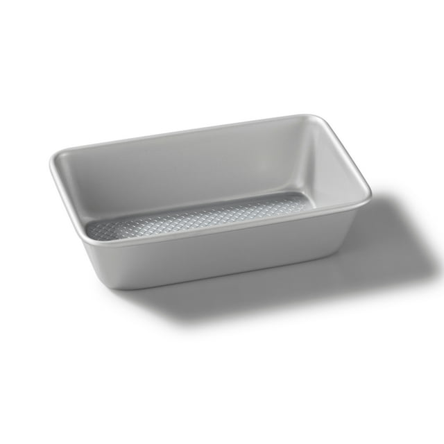 Rectangular 5x9 inch Rock Wave Loaf Pan with non-stick, heavy gauge carbon steel construction and textured base for even baking.