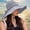 Gray, variant on UTSJKR Womens Braided Band Wide Brim Bucket Hat with Rear Tie Ribbon for Summer Seaside Escape Vineyard Tour Downtown Stroll Foldable Lightweight Anti-UV Vacation Headwear Khaki
