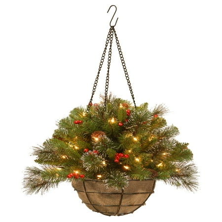National Tree 20" Crestwood Spruce Chain Hanging Basket with Silver Bristle, Cones, Red Berries, Glitter, Coconut Fiber in Basket and Battery Operated LED