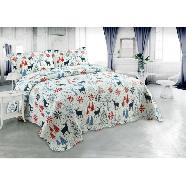 Ultra soft Marina Decoration quilt set featuring embossed pinsonic coverlet with Xmas reindeer, trees, and snowflakes pattern in red and blue on white bedding.