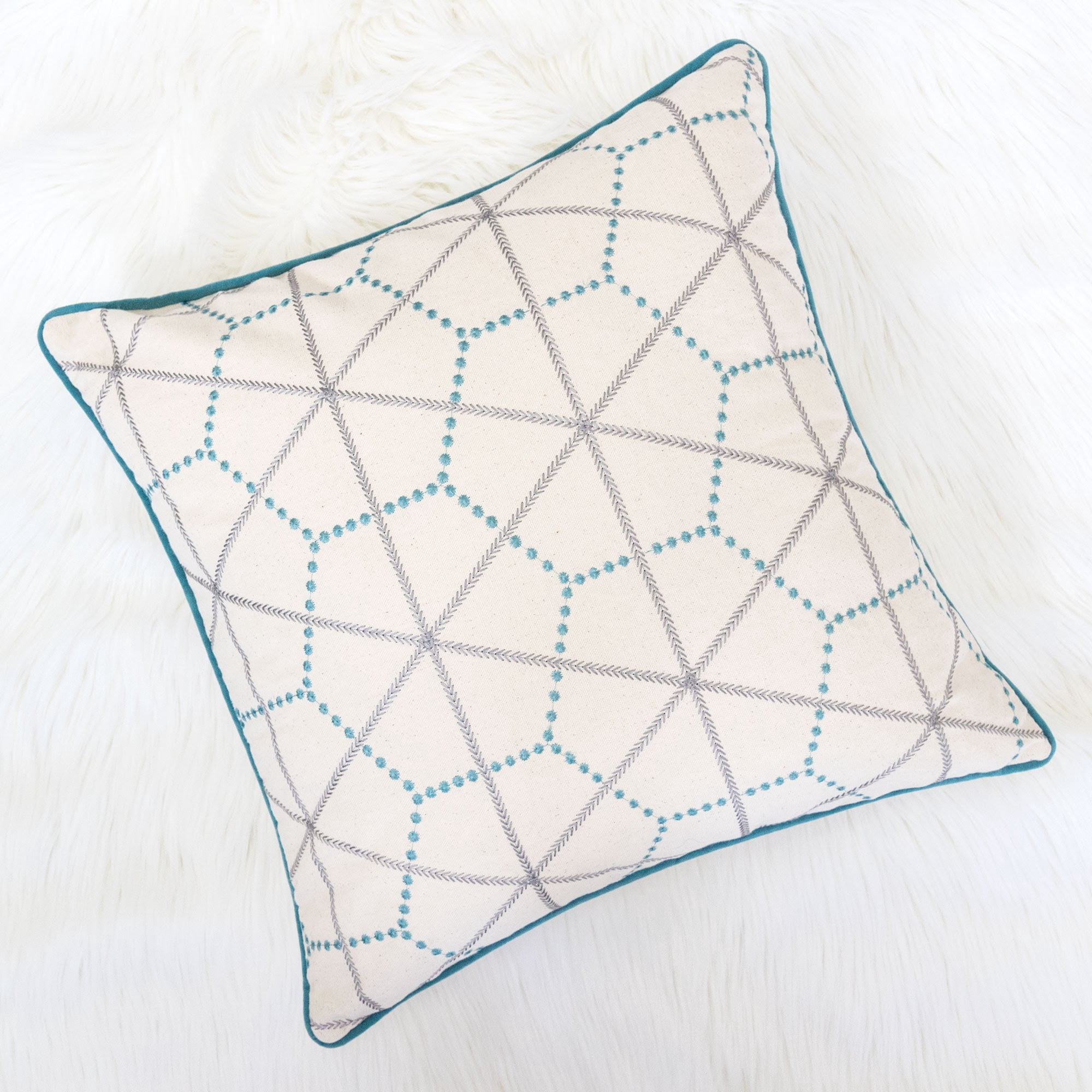 Helen Turquoise Geometric Polyester 20 in. x 20 in. Throw Pillow