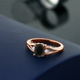 thumbnail image 4 of Gem Stone King 18K Rose Gold Plated Silver Black Onyx and White Moissanite 3 Stone Engagement Ring for Women | 1.68 Cttw | Oval 8X6MM | Round 2MM | Gemstone December Birthstone | Size 7, 4 of 5