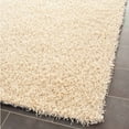 thumbnail image 4 of SAFAVIEH Clyde Solid Plush Polyester Shag Area Rug, Cream, 8' x 10', 4 of 7