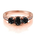 thumbnail image 2 of Gem Stone King 2.60 Cttw Oval Black Sapphire 18K Rose Gold Plated Silver Moissanite Ring for Women | Gemstone Birthstone | Oval 7X5MM and Round 5MM (Size 6), 2 of 4
