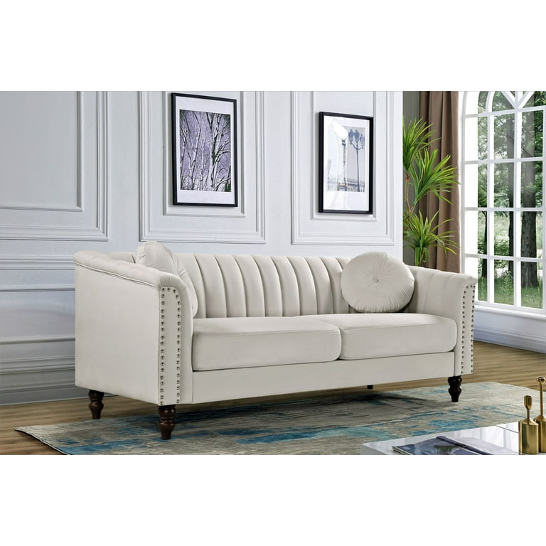 Tufted ivory sofa discount