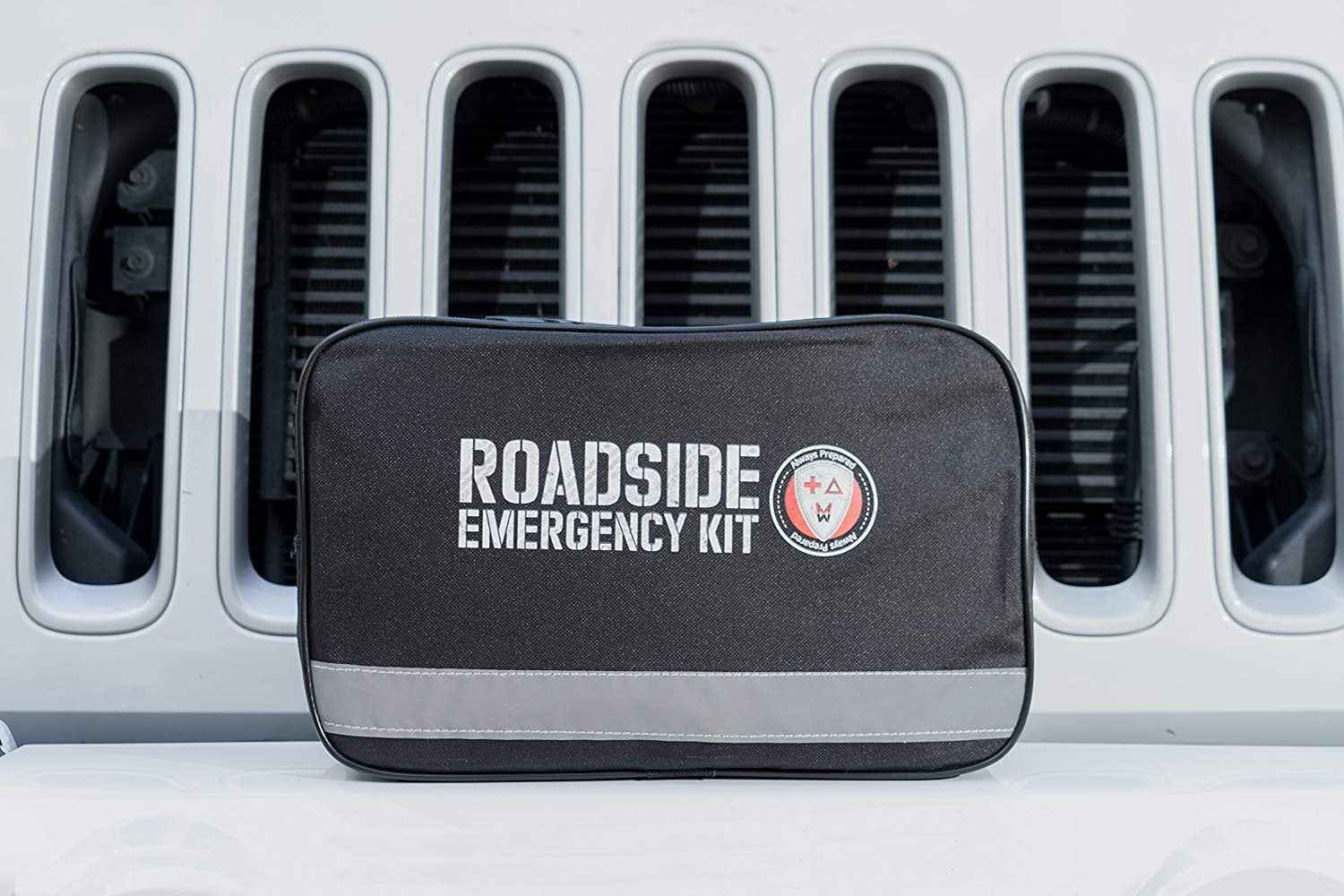 Roadside Assistance Car Emergency Kit - First Aid Kit, Jumper Cables, Tow Rope, LED Flash Light, Rain Coat, Tire Pressure Gauge, Safety Vest & More Ideal Winter Accessory For Your Car, Truck Or SUV