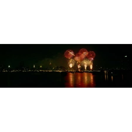 Fireworks display at night on Independence Day New York City New York State USA Canvas Art - Panoramic Images (18 x