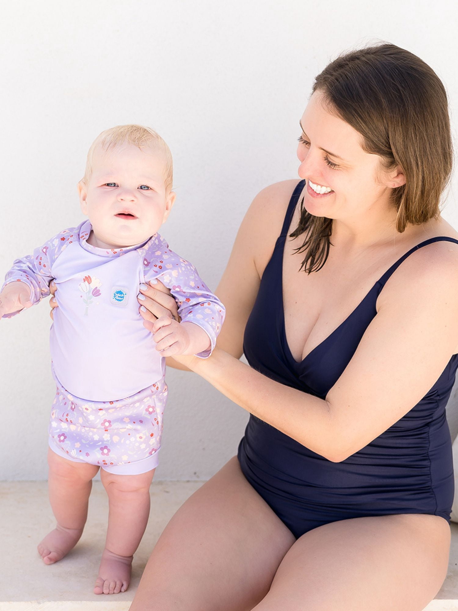 Splash About Happy Nappy Sunsuit with swim diaper, Lilac Spring, 12-24 Months