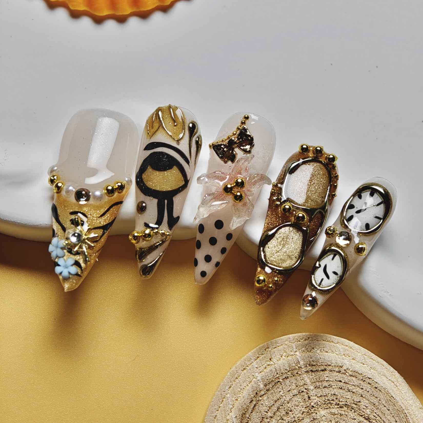 Handmade Press-on Nails with Gold Accents and 3D Artistic Design
