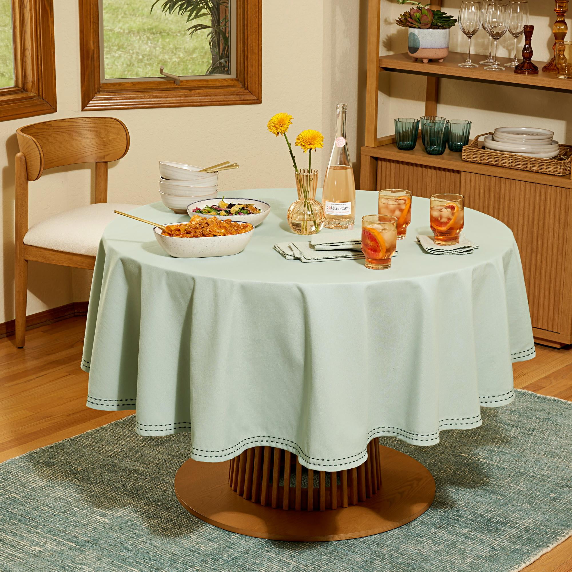 Beautiful by Drew Barrymore Solid Fabric Tablecloth with Double Pop Stitch Hem, Sage Green, 70 in Round