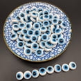 thumbnail image 1 of Cuentas de resina de ojo malvado de forma redonda ovalada de 6/8/10/12MM, cuentas espaciadoras para fabricación de joyería DIY, abalorio, pulsera, pendientes, collar Tan Jianjun unisex, 1 of 2