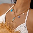 thumbnail image 4 of PISONIC Women Gold-Tone Chain Choker Necklace, Boho Ocean Statement Necklace with Blue Fish Pendant, Tassel, Imitation Pearl & Clear Beads, Summer Beach Vacation Casual Jewelry, 4 of 6