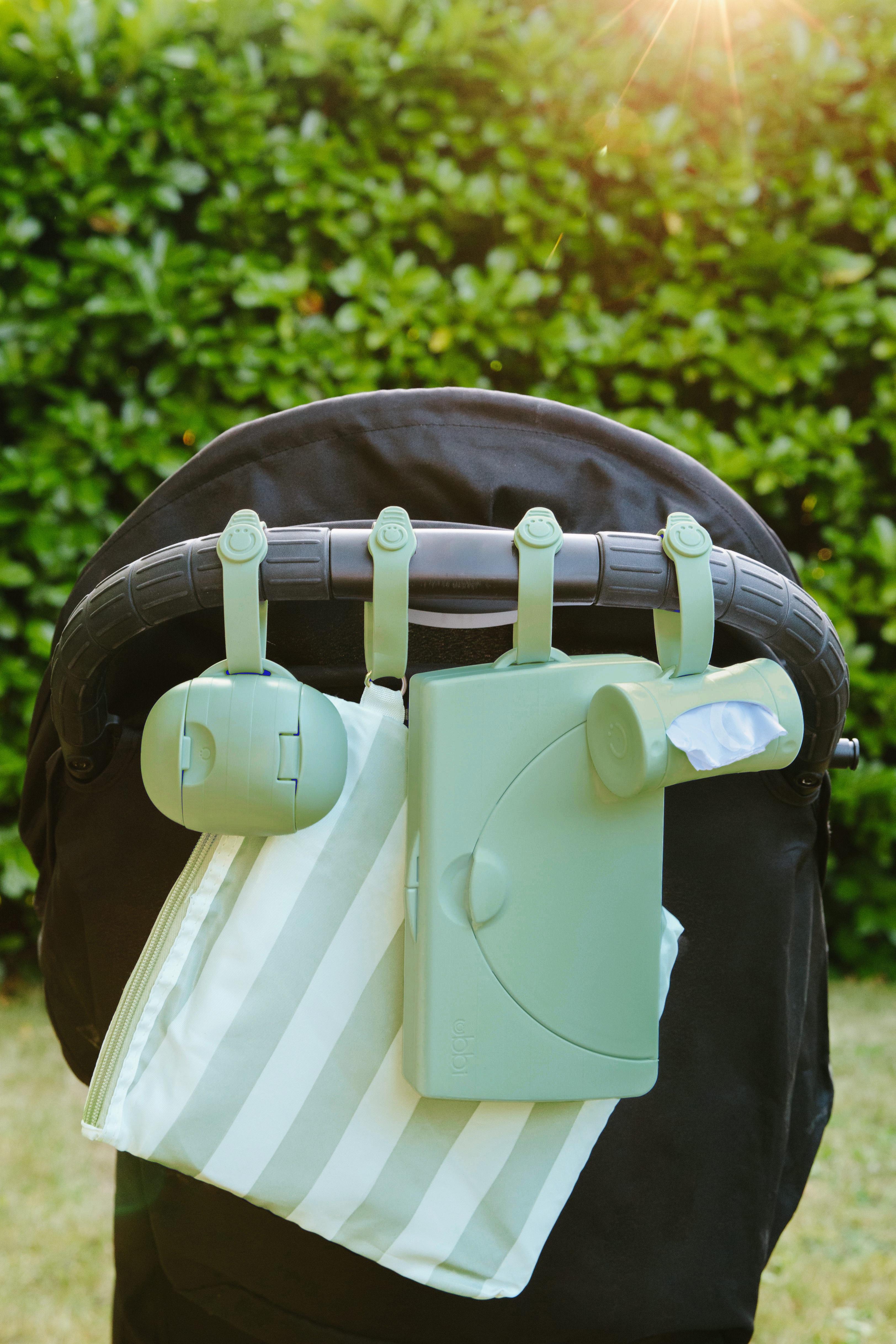Ubbi On-The-Go Diapering Gift Set, Includes Changing Mat and Bag, Wipes Dispenser, Pacifier Holder and Bag Dispenser, Newborn Essentials, Sage