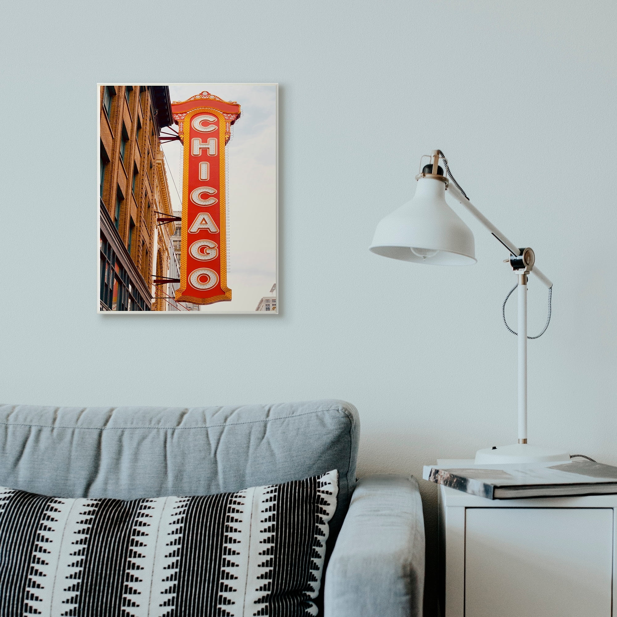 The Stupell Home Decor Bright Red Vertical Light Up Chicago Sign on the Street Wall Plaque Art