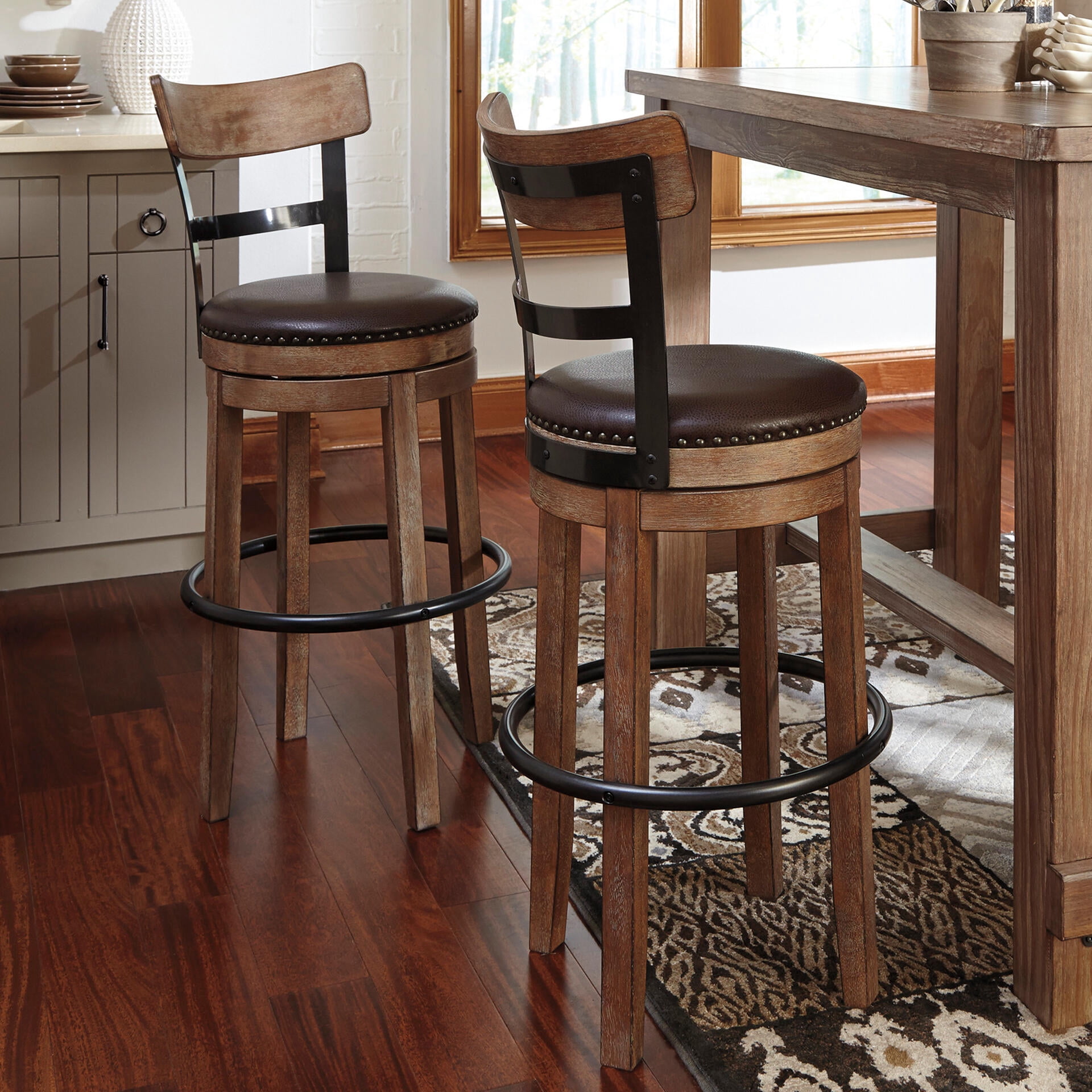 Signature Design by Ashley Pinnadel Swivel Bar Stool, Light Brown, Upholstered Pub Height Chair with 360-Degree Swivel and Faux Leather Seat
