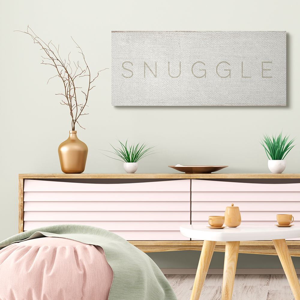 Daphne Polselli Snuggle Text Minimal Distressed Beige Paint 40 in x 17 in Drawing Canvas Art Print, by Stupell Home Décor