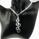 thumbnail image 1 of Collar largo femenino Hugo de Aleaciónes plateadas con borla ovalada, 1 of 9