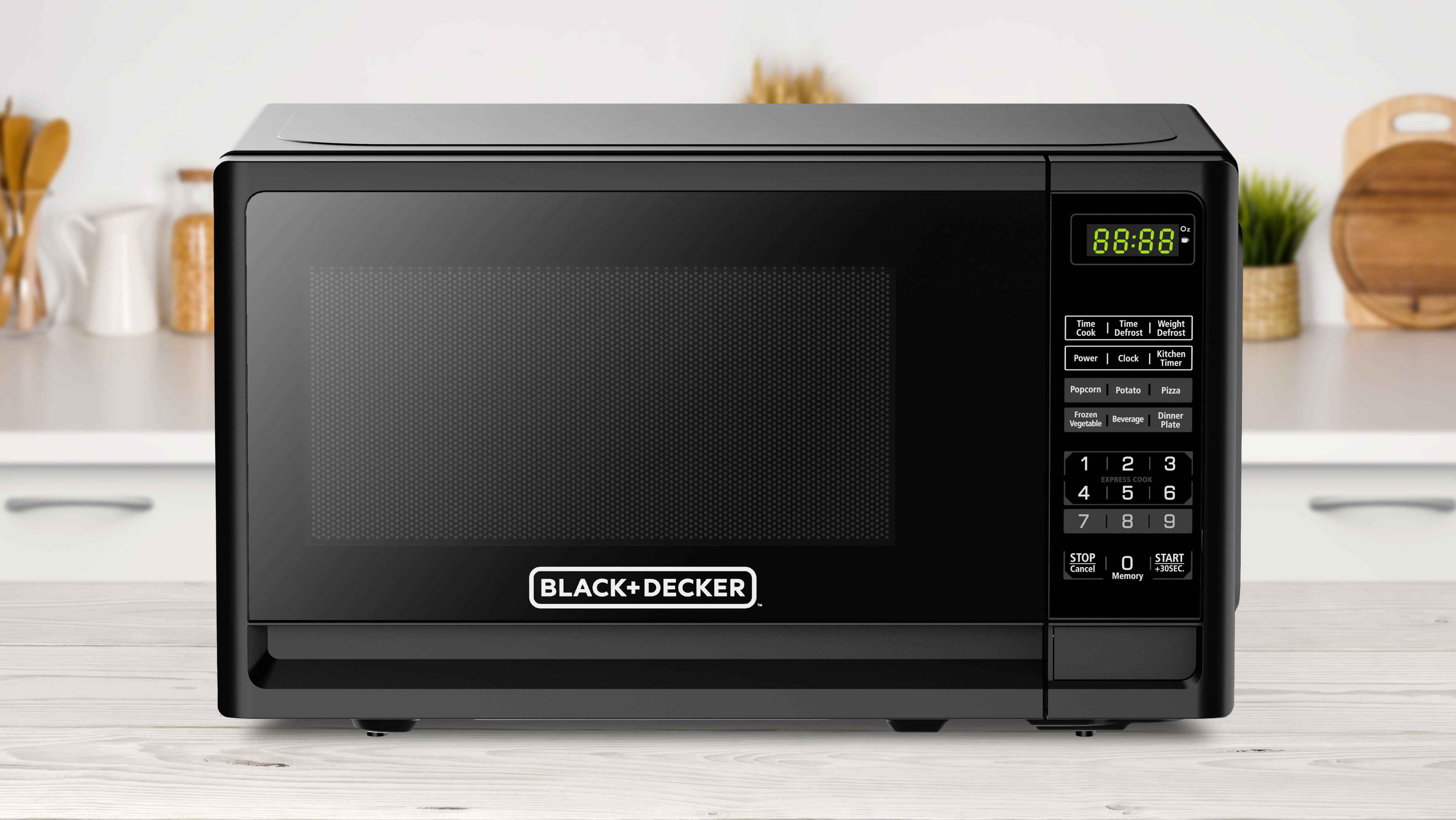 Black & Decker 0.7 Cubic Foot 700 Watt Compact Countertop Microwave with  Turntable - Stainless steel (EM720CPN)