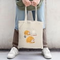 thumbnail image 2 of Stylish Canvas Tote Bag with Fun Cycling Helmet Illustrations - Perfect for Shopping Travel and Parties, 2 of 4