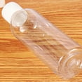thumbnail image 6 of Plastic Empty Bottles, Clear Travel Containers, Travel Size Bottles with Flip Cap Squeezable Refillable Toiletry, 25 Pack, 2.03 oz/60ml, 3.94x1.38", 6 of 7