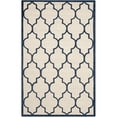 thumbnail image 1 of Safavieh Cambridge 5' X 8' Hand Tufted Wool Rug in Ivory and Navy, 1 of 1