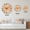 thumbnail image 4 of Designart 'Minimal Bright Shining Orange Sun Rays III' Modern Wood Wall Clock, 4 of 5