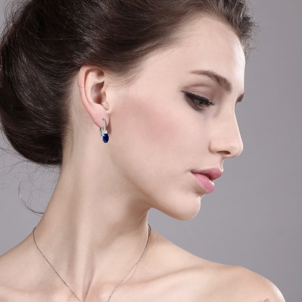 Gem Stone King 925 Sterling Silver Blue Sapphire and White Created Sapphire Leverback Earrings for Women (1.18 Cttw, Gemstone September Birthstone, Oval 6X4MM, Round 2MM, 3/4 inch)