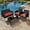 Red, variant on Tappio 4-Piece Rattan Patio Furniture Set, Outdoor Wicker Conversation Set with Tempered Glass Table, Black