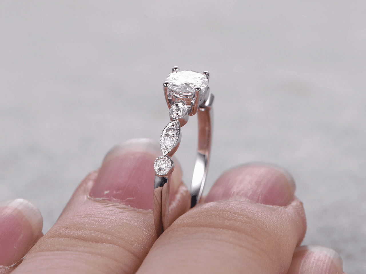 HeartsAndYou 1.2ct Round Cut Moissanite Engagement Ring for Women 18k White Gold Over Silver Vintage Inspired Milgrain Stylish