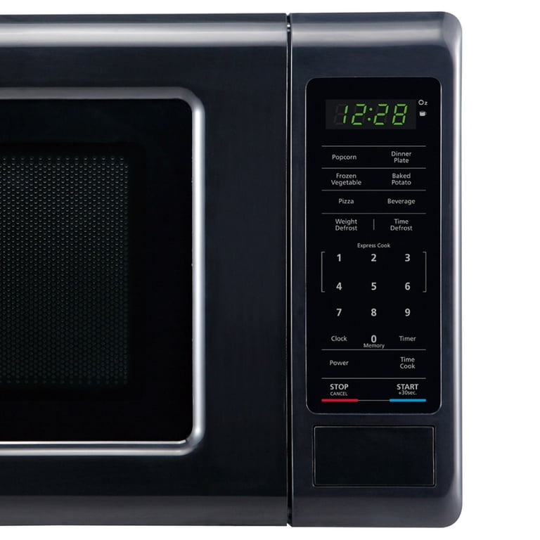 Magic Chef MCM770B Countertop Microwave Oven, Small Microwave for Compact  Spaces, 700 Watts, 0.7 Cubic Feet, Black…