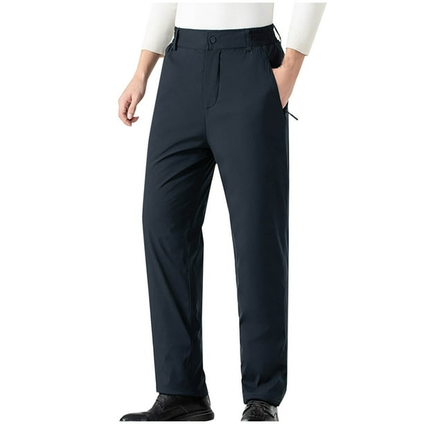 Pantalones largos de moda para hombre, casuales, de color sólido, con cintura elástica y bolsillos, pantalones largos de poliéster para hombre.