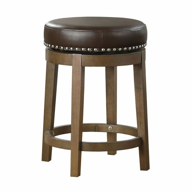 Round swivel counter height stool featuring a brown faux leather cushioned seat with nailhead trim and sturdy wooden legs.