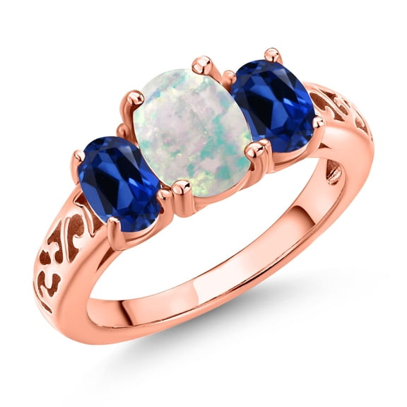 Gem Stone King 18K Rose Gold Plated Silver White Opal and Blue Created Sapphire Filigree Style 3 Stone Ring for Women (2.20 Cttw, Oval 8X6MM and 6X4MM) (Size 5)