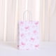 thumbnail image 2 of Bolsas de regalo de papel kraft con lazo rosa para cumpleaños y fiestas, 24 unidades, 2 of 3