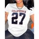 thumbnail image 1 of Women's California 27 Graphic Tee - Casual Crew Neck Short Sleeve T-Shirt, Stretchy Polyester Blend, White with Navy Blue & Red Number Print, Comfortable Summer Top for Casual Attire, Ladies T Shirts, 1 of 6