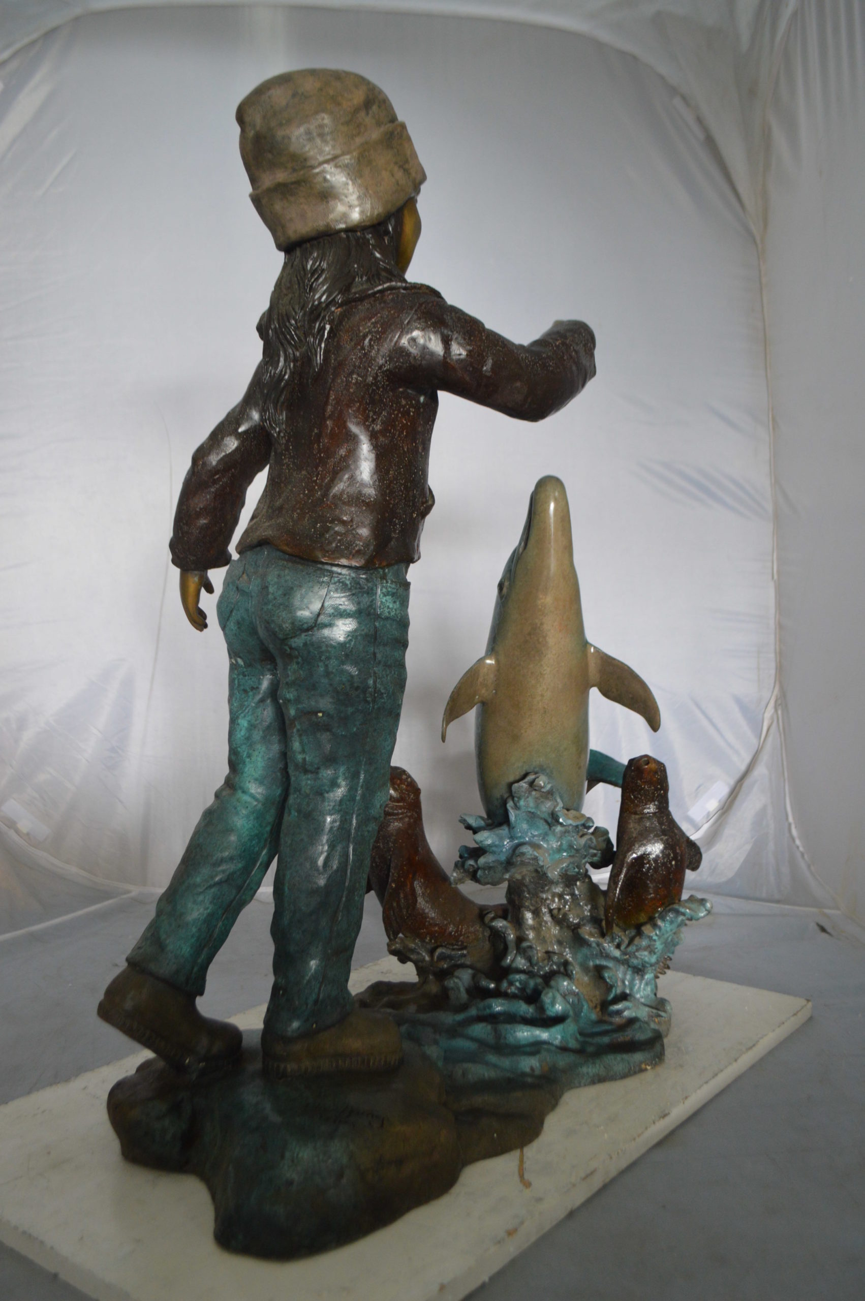 Nifao Girl feeding a dolphin and seals – Outdoor Bronze Fountain, Garden Water Feature, 28"L x 17"W x 37"H