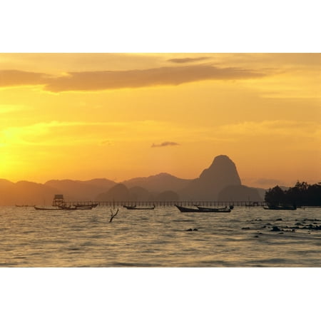 Thailand Phangna Bay Boats Anchored Pier And Mountains At Sunset Golden Orange Sky Stretched Canvas - Robert Sablan  Design Pics (19 x