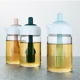 thumbnail image 3 of Botella de aceite con cepillo Soidarity sellado contra el polvo rosa 2 en 1, 3 of 6