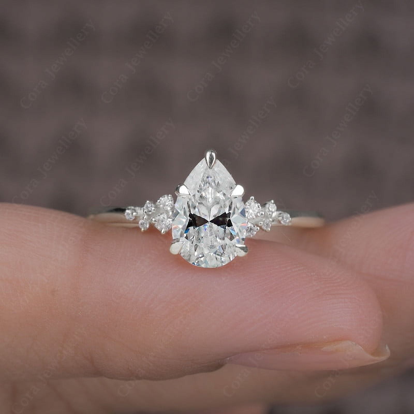 Cora Jewellery 1.25TCW Snow Drift Pear Moissanite Engagement Ring for Women, 10K White Gold, 7.5 US