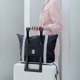 thumbnail image 1 of Bolsa de Viaje Portátil con Almacenamiento, Bolsa de Mano, Bolsa de Equipaje, Bolsa de Almacenamiento Que Se Puede Colocar En La Maleta con Ruedas, Bolsa de Equipaje de Color Sólido, 1 of 7