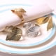 thumbnail image 4 of Paquete de 12 anillos para servilletas, anillo para servilleta con forma de plumas, Material de acero inoxidable, 4 of 5